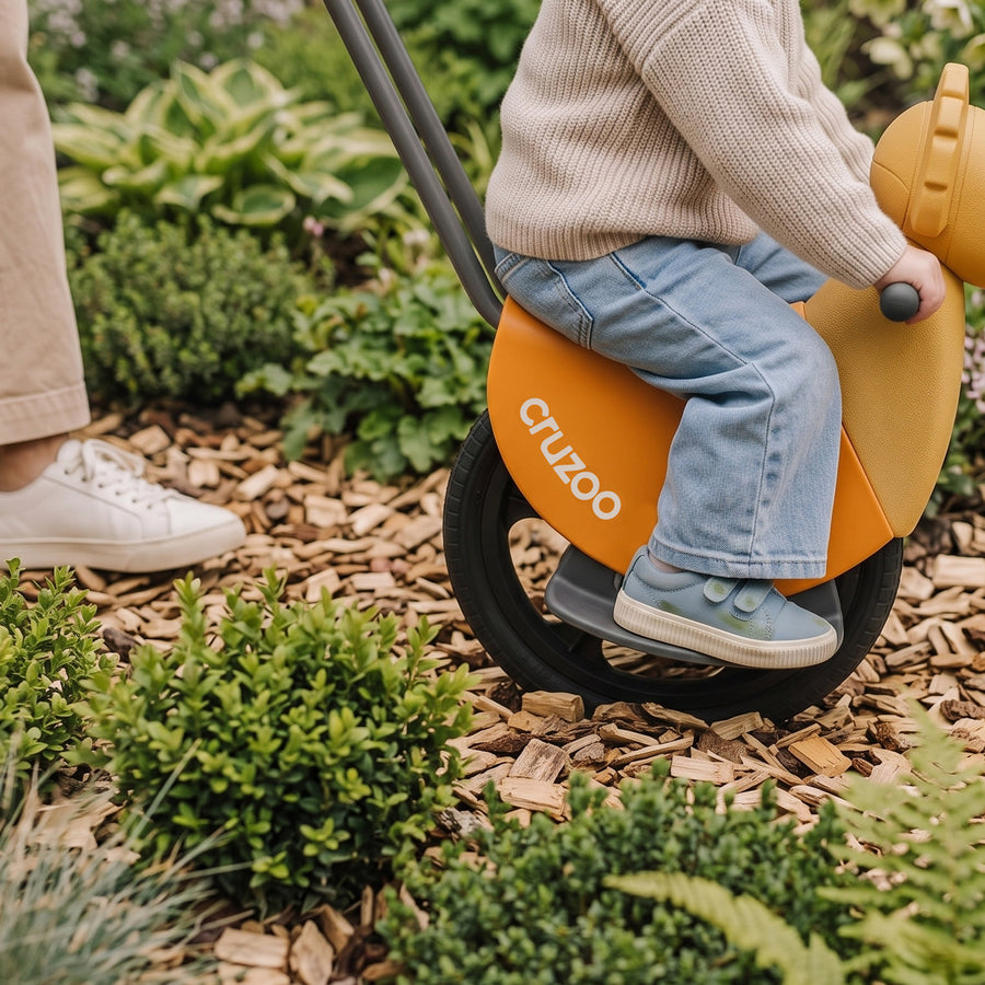 Cruzoo wheel rolling over wood chips
